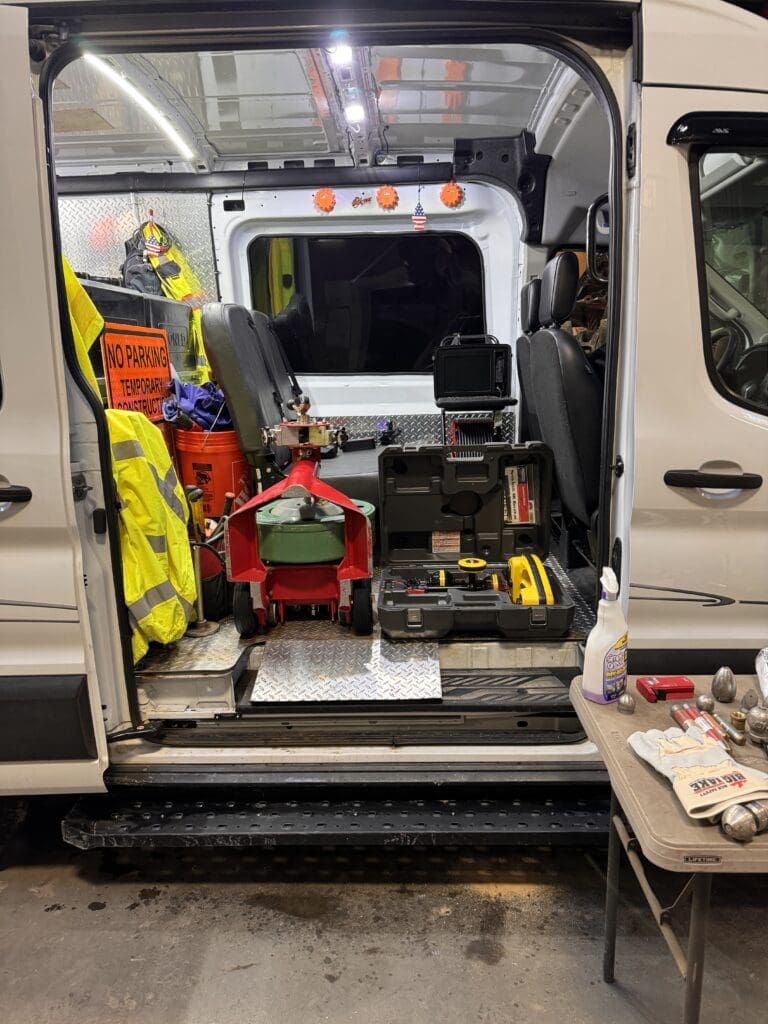 A van with a sewer and drain equipment